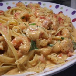 Pasta with shrimp in tomato cream