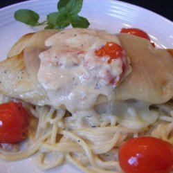 Mozzarella Topped Chicken With Roasted Tomato and Basil Sauce