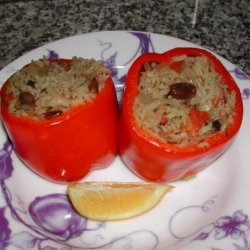 Stuffed Red Bell Peppers With Rice, Pine Nuts and Currants