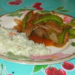 Tangerine Stir-Fried Beef With Onions and Snow Peas