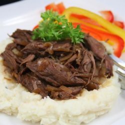 French Onion Beef over Garlic Mashed Potatoes
