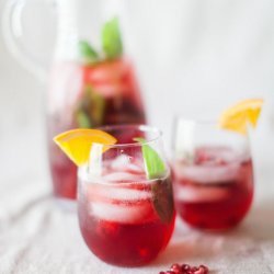 Pomegranate Basil Champagne Cocktail