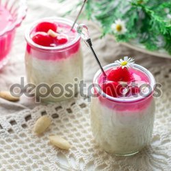 Rice Pudding With Almonds and Cherry Sauce