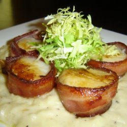 Bacon Wrapped Sea Scallops Served on Creamy Brie Sauce