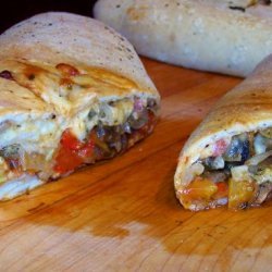 Stromboli With Prosciutto, Peppers, Onions, Garlic & Shrooms