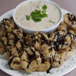 Fried Calamari With Remoulade Sauce Drizzled With Balsamic Syrup