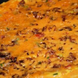Open-Faced Bacon and Hash Browns Omelet