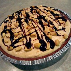 Frozen Peanut Butter Cheesecake With Fudge Sauce Topping