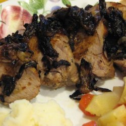 Roasted Pork Loin With Blackened Onions and Dark Gravy