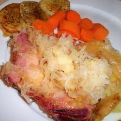 Smoked Pork Chop With Sauerkraut, Potatoes & Applesauce