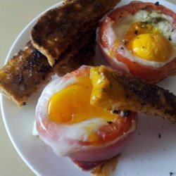 Eggs Baked in Tomatoes With Prosciutto & Basil