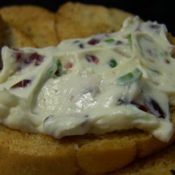Garlic Crostini With Cream Cheese, Cranberries and Onions