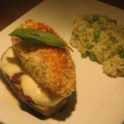 Parmesan Crusted Chicken on Eggplant Sun Dried Tomato and Mozzar