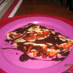 Crepes With Strawberries and Chocolate Sauce