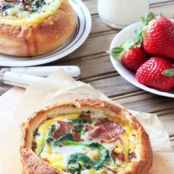 Baked Eggs in Bread Bowls