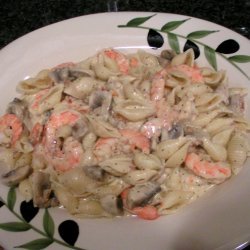 Spicy Shrimp And Mushrooms In A Creamy Pasta Sauce