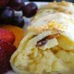 Crepes Stuffed With Scrambled Eggs And Bacon