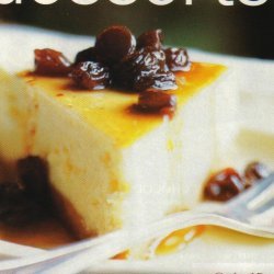 Vanilla Cheesecake With Rum Raisin Syrup