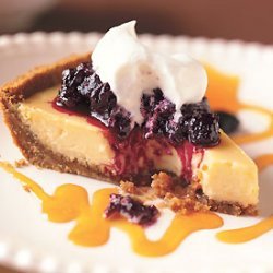 Key Lime Pie with Passion Fruit Coulis and Huckleberry Compote