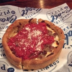 Deep-Dish Sausage and Tomato Pizza