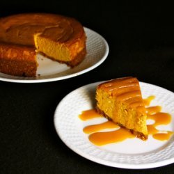Spiced Pumpkin Cheesecake with Spicy Caramel Sauce