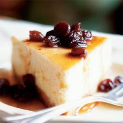 Vanilla Cheesecake with Rum Raisin Syrup