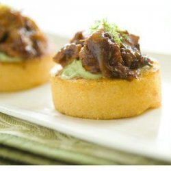 Seared Cheddar Polenta Rounds with Barbecued Chicken and Avocado Sauce
