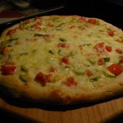 Zucchini and Fresh Tomato Pizza With Fontina