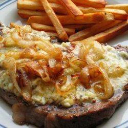 Pub Style Peppered Stilton Steaks With Charred Onions and Chips